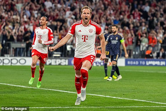 MUNICH, GERMANY – APRIL 30: Harry Kane of FC Bayern Munich celebrates with teammates after scoring his team's second goal during the UEFA Champions League semi-final first leg between FC Bayern Munich and Real Madrid at the Allianz Arena on April 30, 2024 in Munich, Germany.  (Photo by Boris Streubel/Getty Images)