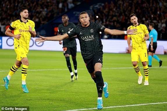 PARIS, FRANCE – SEPTEMBER 19: Kylian Mbappe of Paris Saint-Germain celebrates after scoring the team's first goal from the penalty spot during the UEFA Champions League Group F match between Paris Saint-Germain and Borussia Dortmund at the Parc des Princes on September 19, 2023 in Paris, France.  (Photo by Johannes Simon/Getty Images)