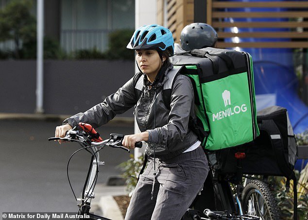 The industry Down Under is booming, fueled by millennials willing to pay for the convenience of having their meals delivered to their homes.  Pictured: riders at McDonald's, Waterloo