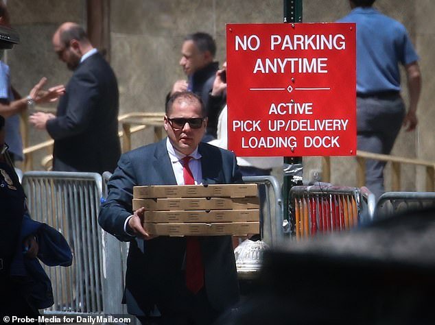Donald Trump's aides bring at least 12 boxes of pizza to the court for lunch