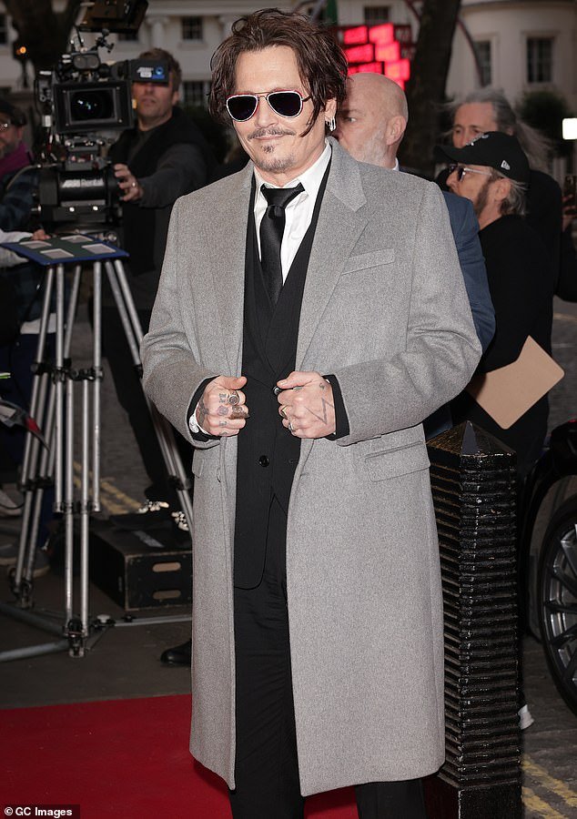 A source said Depp is 'prioritizing his health and wellbeing a lot more these days', adding: 'People loved his look for the Jeanne du Barry premiere in the UK' (pictured)
