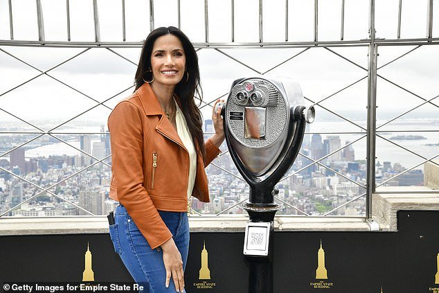 Here she is seen on the balcony overlooking New York City at the Empire State Building