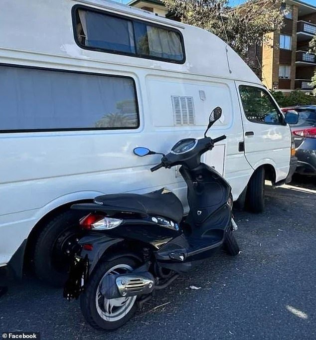 Ms Brown could have been at risk of being fined because the scooter was double-parked next to a white camper (pictured)