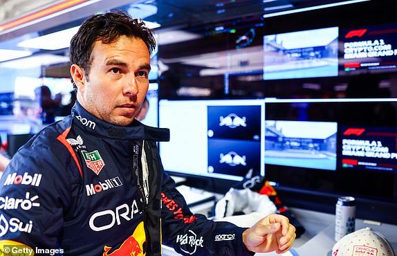 MIAMI, FLORIDA – MAY 05: Sergio Perez of Mexico and Oracle Red Bull Racing prepare to drive in the garage ahead of the F1 Grand Prix of Miami at Miami International Autodrome on May 5, 2024 in Miami, Florida.  (Photo by Mark Thompson/Getty Images)