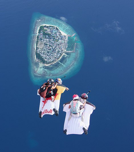 Guests of Ifuru Island Maldives can take a skydive to the resort