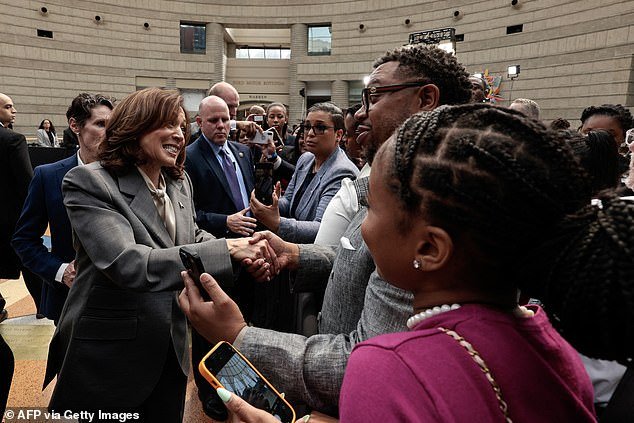 U.S. Vice President Kamala Harris (L) greets attendees after speaking during the second stop of her nationwide Economic Opportunity Tour