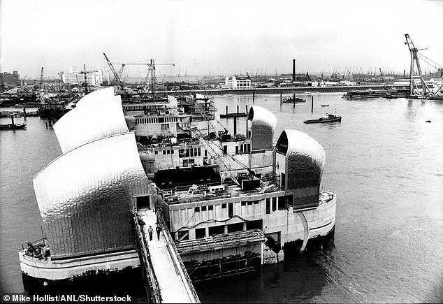 The Thames Flood Barrier is seen under construction in 1980, four years before it became operational and began protecting London
