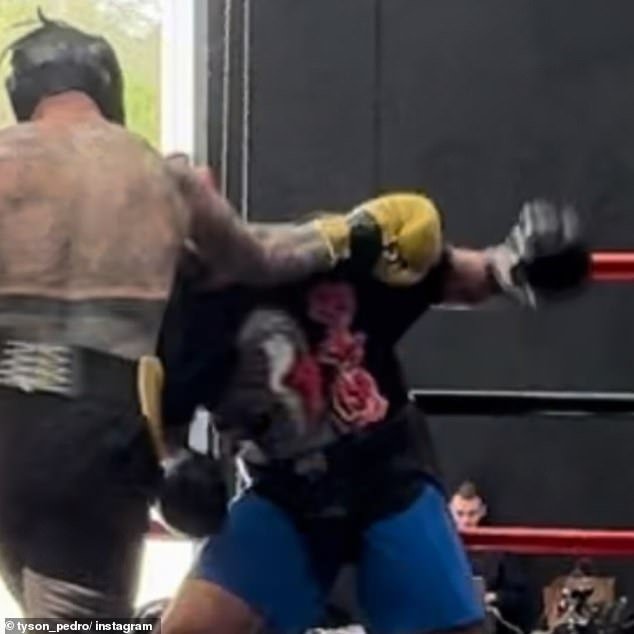 Ex-UFC star Tyson Pedro (pictured in black shorts) has shared a photo of the moment he broke his elbow