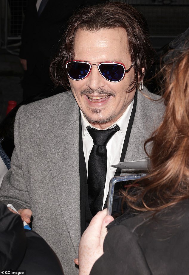 Johnny Depp is in 'very good spirits' and harbors 'no animosity towards anyone' as he continues his comeback;  pictured at the UK premiere of Jeanne du Barry last month