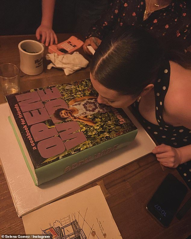 Selena Gomez suggestively licked a cake with her boyfriend Benny Blanco's photo on it in a racy new post - after he bragged about their sex life
