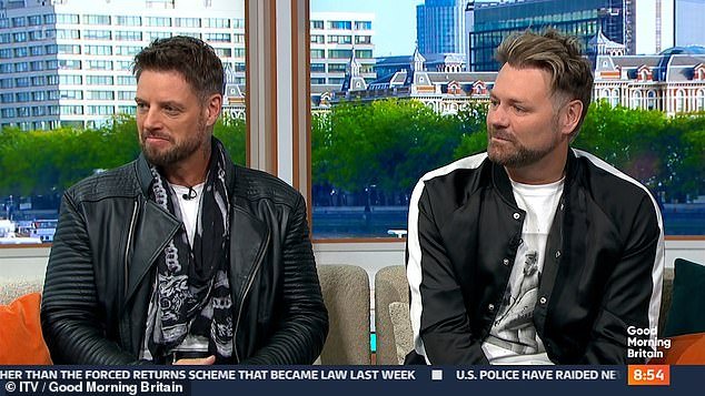 The journalist, 53, was chatting to Boyzone's Keith Duffy (left) and Westlife's Brian McFadden (right) alongside her co-host Richard Madeley
