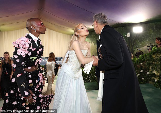One of the most awkward photos from Monday's Met Gala in New York City has emerged.  Ariana Grande is seen air kissing Jeff Goldblum.  Next to her stood her friend Cynthia Erivo, waiting her turn for her hug while she also puckered up